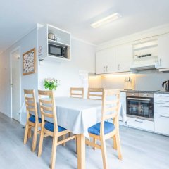 Kitchen with dining table and chairs.