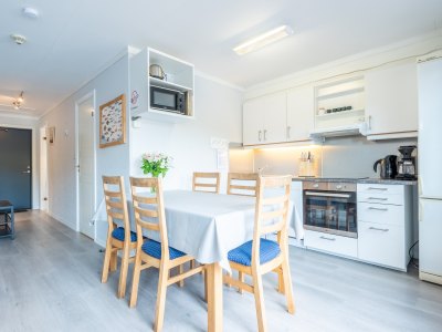 Kitchen with dining table and chairs.