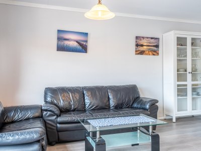 Living room with sofa and coffee table.