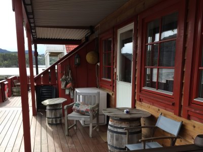 Balcony with outdoor seating area.