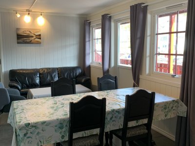 Dining table and windows in living room.