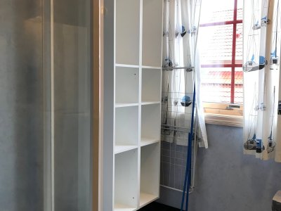 Apartment Type 3 bathroom with shower and storage – Sotra Rorbusenter