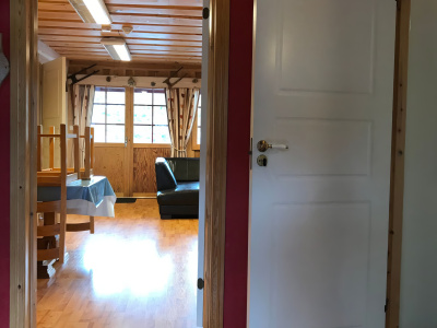 Apartment hallway entrance with view to living area.