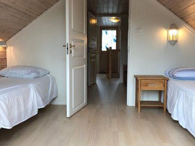Loft bedroom with twin beds.