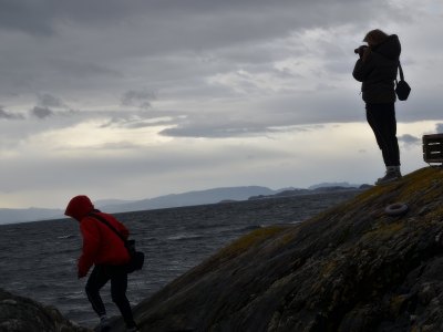 People hiking on the Sotra coastline.