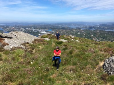 Hikers on a mountain trail in Sotra.