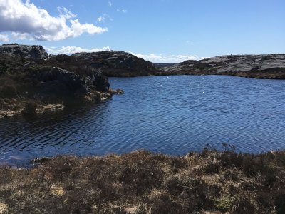 Rocky lake landscape in Sotra.